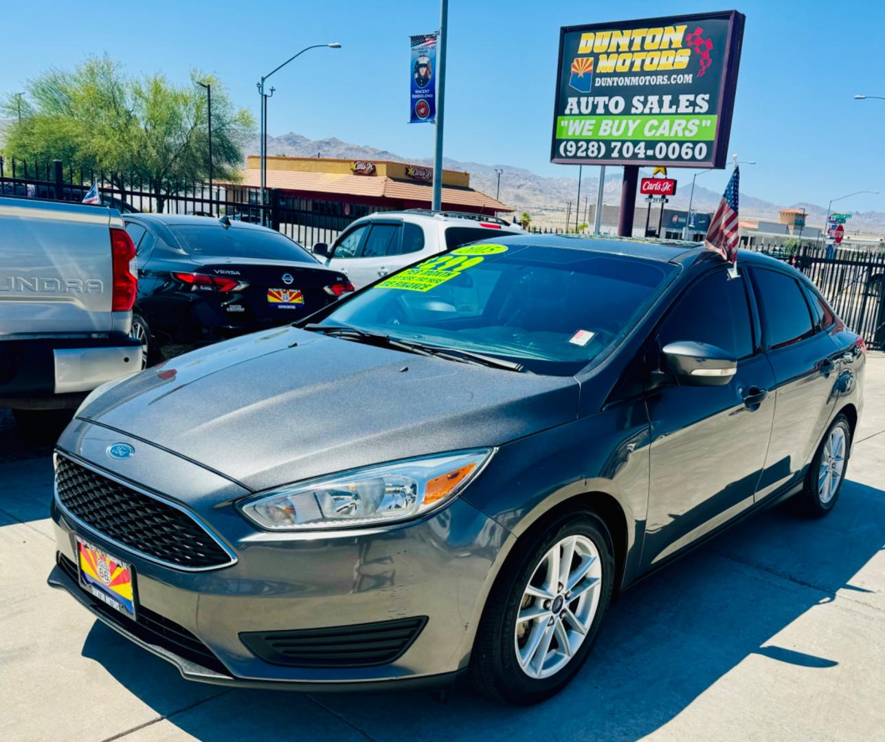 2015 grey Ford Focus (1FADP3F27FL) , located at 2190 Hwy 95, Bullhead City, AZ, 86442, (928) 704-0060, 0.000000, 0.000000 - 2015 Ford Focus SE. 88k miles. new transmission with warranty. runs and drives great. completely serviced. free warranty, free carfax. buy here pay here. we finance. only at Dunton Motors. - Photo#1